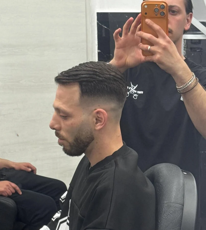 Razor fade con barba curata e definita